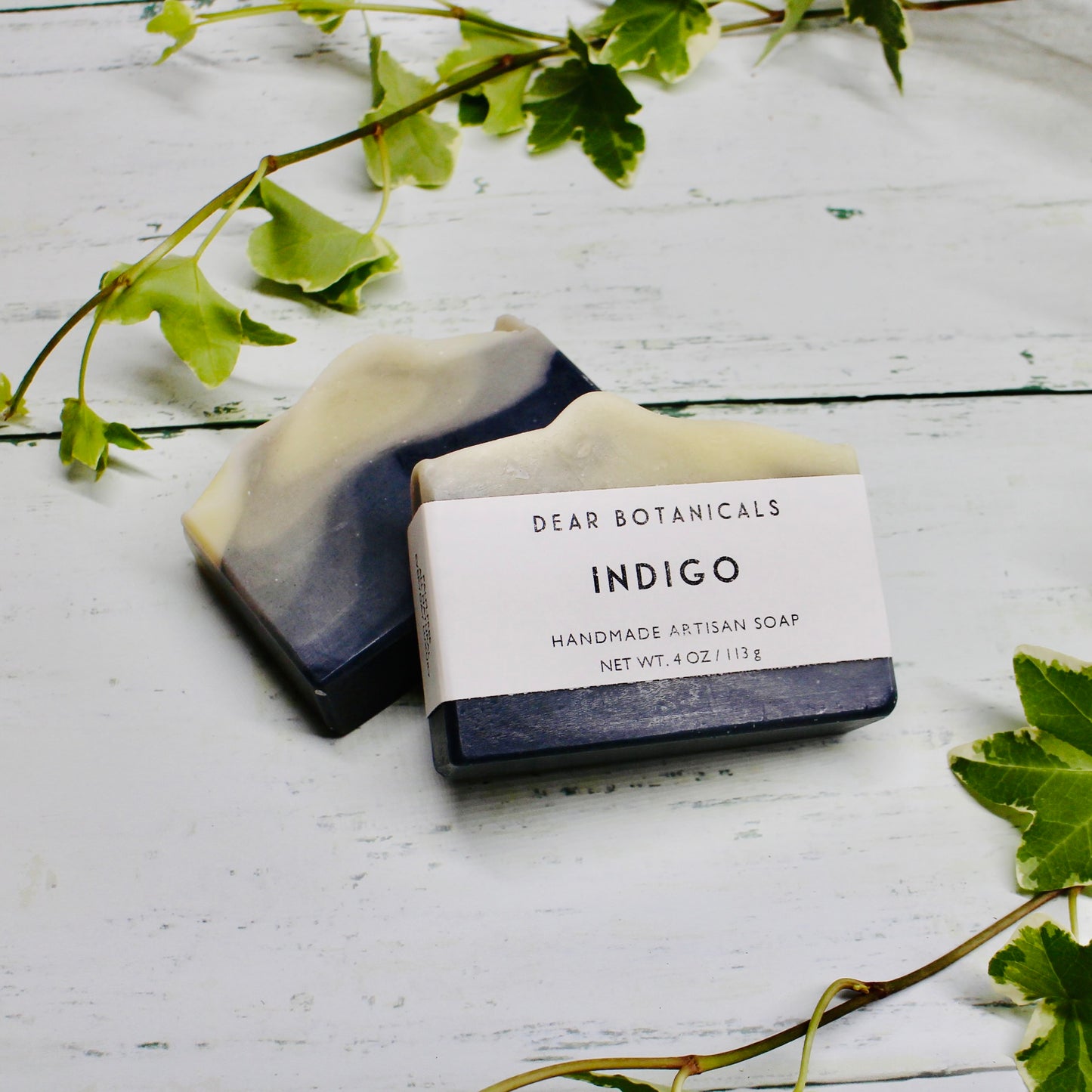 Dear Botanicals Indigo Soap, dark blue and cream swirl effect.